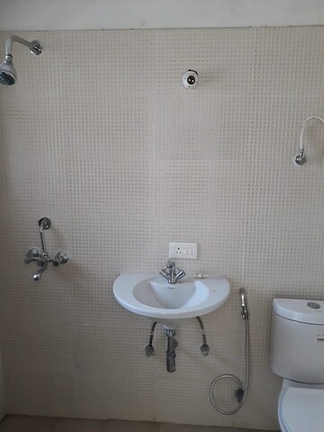 Bathroom in 2 BHK Apartment at Aditya Urban Casa, Sector 78 – for Rent