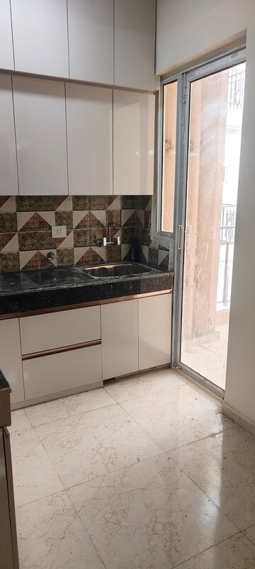 Kitchen in 2 BHK Apartment at MRG The Balcony, Sector 93 – for Rent