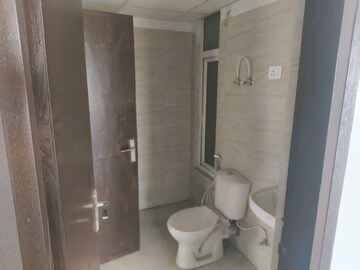 Bathroom in 2 BHK Apartment at Ajnara Panorama Facing F1, Sector 22 Yamuna Expressway – for Rent