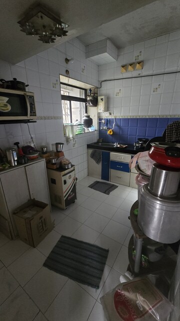 Kitchen in 3 BHK Apartment at Om Sagar Darshan CHS, Nerul – for Sale