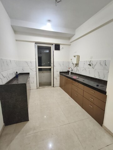 Kitchen in 3 BHK Apartment at T.T.C. Industrial Area – for Rent