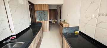 Kitchen in 2.5 BHK Apartment at Ravetkar Sukhniwas, Senapati Bapat Road – for Sale