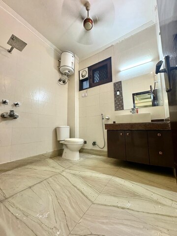 Bathroom in 1 RK Apartment at Apex Anuradha Apartments, Paschim Vihar – for Rent