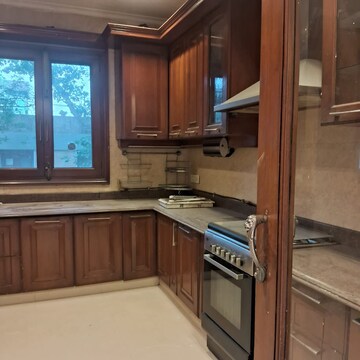 Kitchen in 4 BHK Apartment at Basant Gaon – for Rent