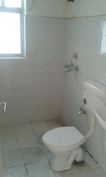 Bathroom in 2 BHK Apartment at Sureka Sunrise Symphony, Rajarhat – for Sale