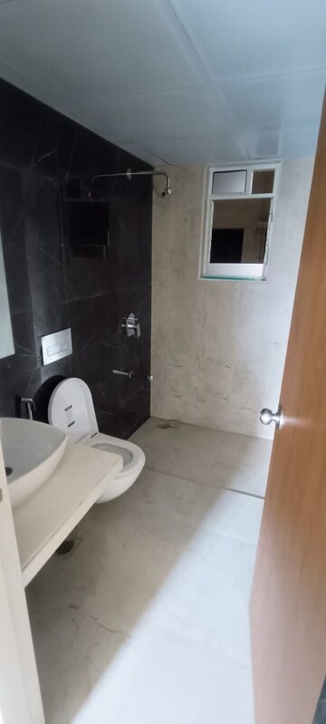 Bathroom in 2 BHK Apartment at Dosti West County Phase 4 Dosti Pine, Balkum Pada – for Rent