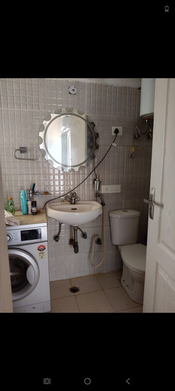 Bathroom in 2 BHK Apartment at Amrapali Princely Estate, Sector 76 – for Rent