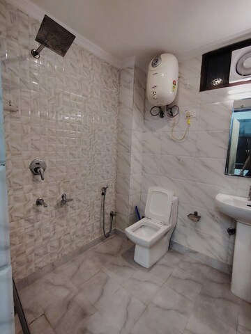 Bathroom in 1 BHK Builder Floor at Malviya Nagar – for Rent