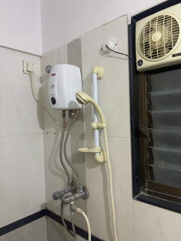 Bathroom in 2 BHK Apartment at Goyal Green Woods, Andheri East – for Rent