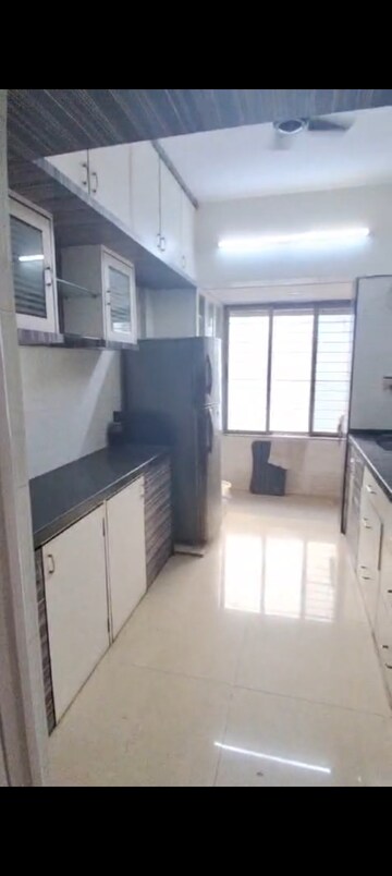 Kitchen in 2 BHK Apartment at Goyal Green Woods, Andheri East – for Sale