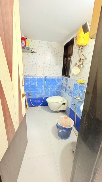 Bathroom in 2 BHK Apartment at Atul Trans Residency, Andheri East – for Rent