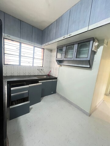 Kitchen in 2 BHK Apartment at Borate Jijai Nagari, Kothrud – for Rent