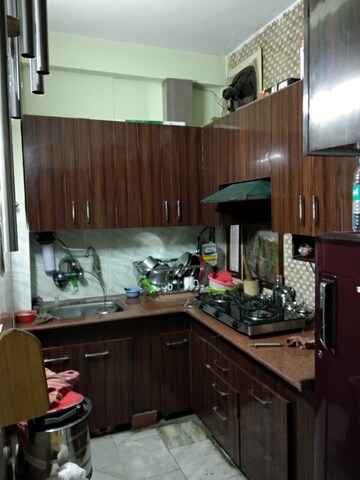 Kitchen in 2 BHK Apartment at Windsor and Nova Society, Ahinsa Khand 2 – for Sale