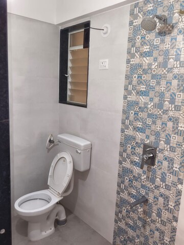 Bathroom in 1 BHK Apartment at DT Golden Nest, Kiwale – for Rent