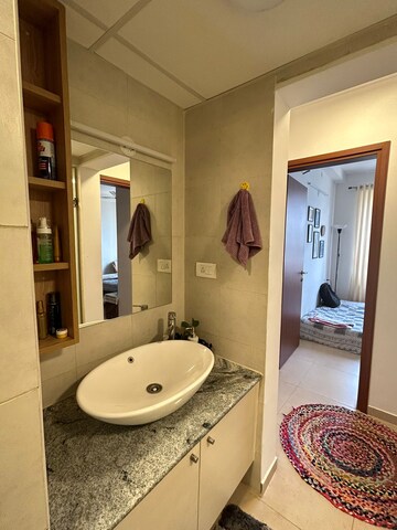 Bathroom in 1.5 BHK Apartment at Bhartiya Nikoo Homes Phase 2, Thanisandra Main Road – for Sale