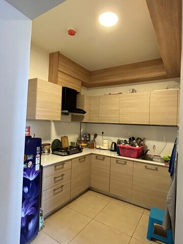 Kitchen in 1.5 BHK Apartment at Bhartiya Nikoo Homes Phase 2, Thanisandra Main Road – for Sale