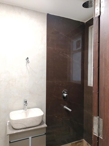 Bathroom in 3 BHK Apartment at Sector 13 Dwarka – for Rent