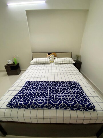 Bedroom in 2 BHK Apartment at Rustomjee Urbania Azziano, Thane West – for Rent