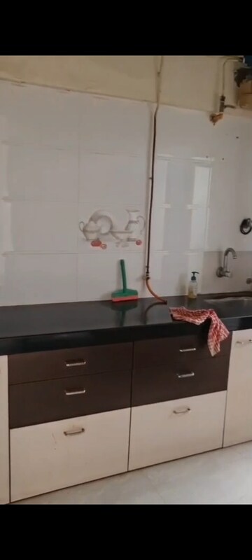 Kitchen in 1 BHK Apartment at Amogh Adjure Apartment, Vile Parle East – for Rent