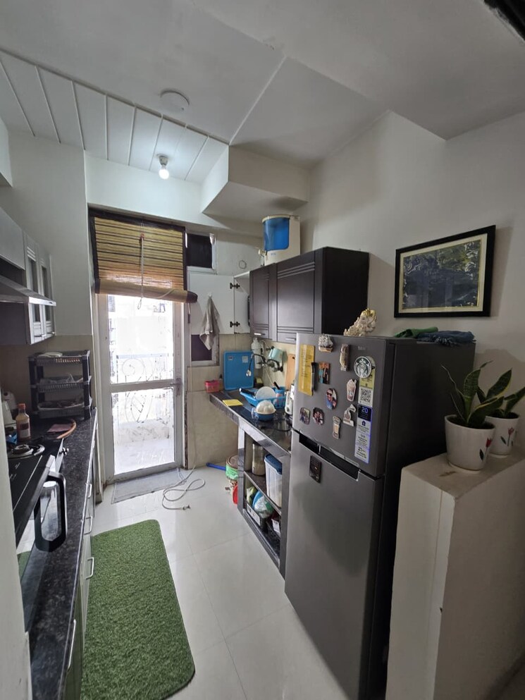 Kitchen, prateek-wisteria 2 Bedroom 955 Sq.Ft. Apartment In Sector 77 Noida 9737558