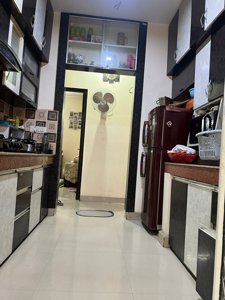 Kitchen, uninav-heights-phase-i 3 Bedroom 1555 Sq.Ft. Apartment In Raj Nagar Extension Ghaziabad 9737599