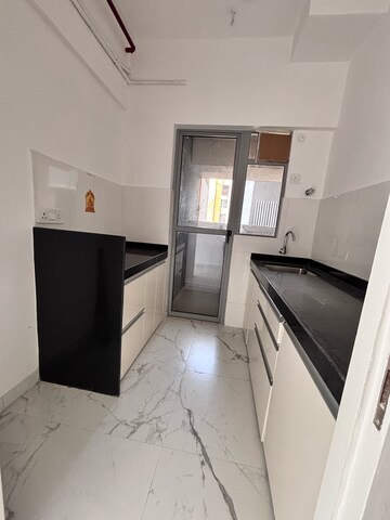 Kitchen in 1 BHK Apartment at Dynamix Avanya, Ketkipada – for Rent