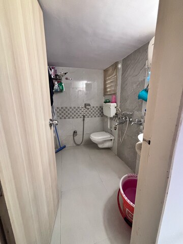 Bathroom in 2 BHK Apartment at Unique Aurum 2, Chandan Shanti – for Sale