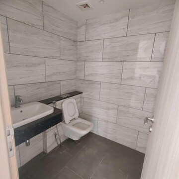 Bathroom in 4 BHK Apartment at Rustomjee Crown, Gokhale Road – for Rent