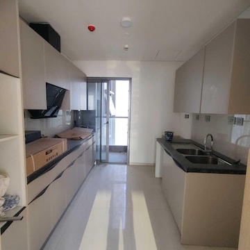 Kitchen in 4 BHK Apartment at Rustomjee Crown, Gokhale Road – for Rent