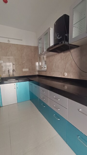 Kitchen in 2 BHK Apartment at Bhandari 7 Plumeria Drive, Tathawade – for Sale