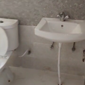 Bathroom in 2 BHK Apartment at Amrapali Kingswood, Haibatpur – for Sale