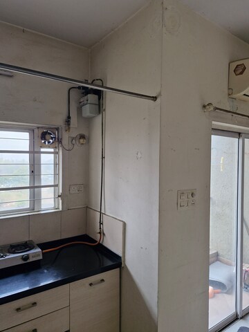 Kitchen in Studio Apartment at Amanora Metro Tower, Hadapsar – for Rent