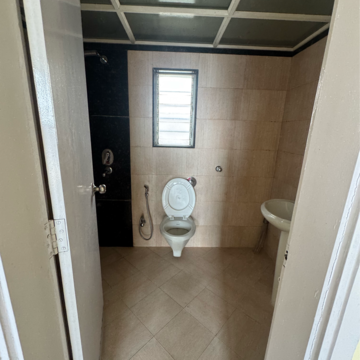 Bathroom in 2 BHK Apartment at Nancy Towers, Netaji Nagar – for Rent