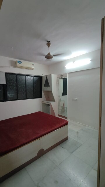 Bedroom in 2 BHK Apartment at Pranay Nagar CHS, Borivali West – for Rent