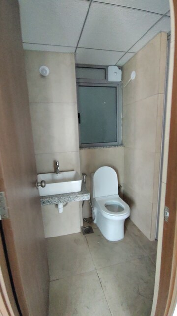 Bathroom in 1 BHK Apartment at Kalpataru Immensa D, Kolshet Road – for Rent