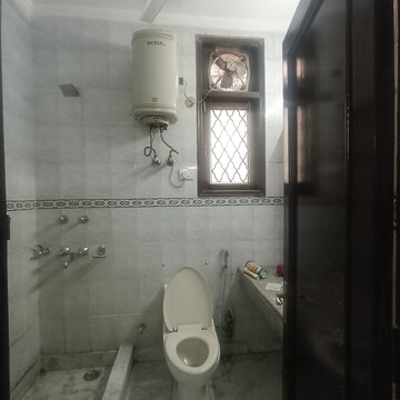 Bathroom in 3.5 BHK Builder Floor at Nehru Enclave – for Rent