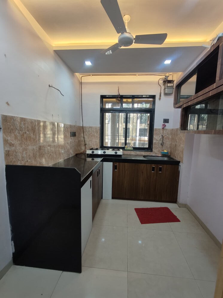 Kitchen, raunak-unnathi-gardens 2 Bedroom 1045 Sq.Ft. Apartment In Pokhran Road No One Thane 9742973