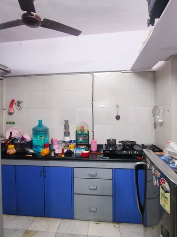 Kitchen in 1 BHK Apartment at Atlanta CHS, Malad West – for Rent