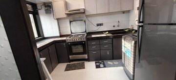 Kitchen in 2 BHK Apartment at Indradarshan II, Oshiwara – for Rent