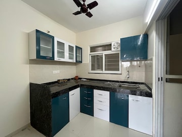 Kitchen in 3 BHK Apartment at Mantra Insignia, Mundhwa – for Rent