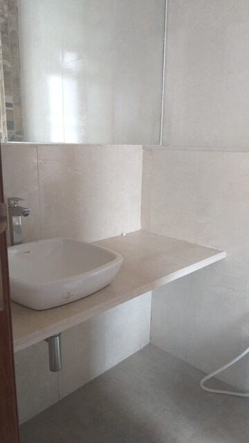 Bathroom in 4 BHK Apartment at Omkar Alta Monte, Malad East – for Rent