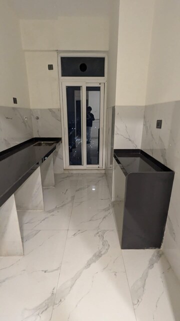 Kitchen in 2 BHK Apartment at Ruparel Sky Green, Kandivali West – for Sale