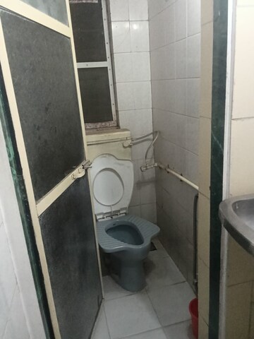 Bathroom in 2 BHK Apartment at Eff Jumbo Darshan CHS, Andheri East – for Rent