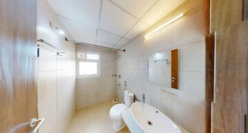 Bathroom in 2 BHK Apartment at Bhartiya Nikoo Homes, Thanisandra Main Road – for Sale