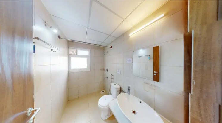 Bathroom, bhartiya-nikoo-homes 2 Bedroom 933 Sq.Ft. Apartment In Thanisandra Main Road Bangalore 9743908