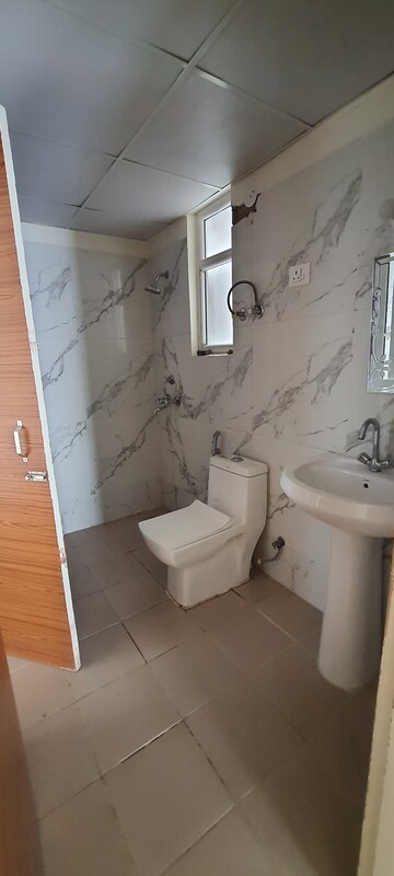 Bathroom in 2 BHK Apartment at JKG Palm Resort, Raj Nagar Extension – for Sale
