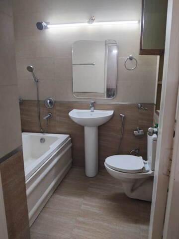 Bathroom in 3 BHK Apartment at Malibu Shopping Arcade, South City 2 – for Rent