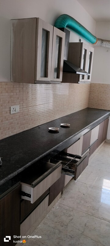 Kitchen in 2 BHK Apartment at Ansal Celebrity Meadows, Sushant Golf City – for Rent