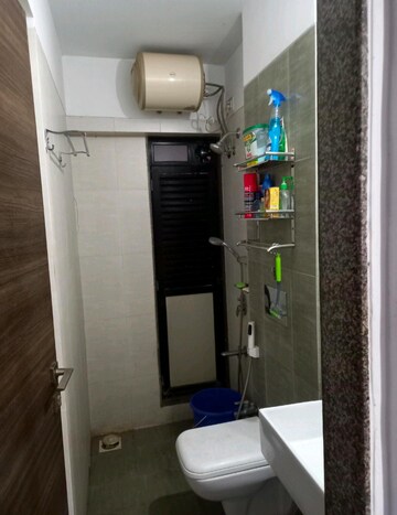 Bathroom in 1 BHK Apartment at Kanakia Rainforest, Andheri East – for Rent