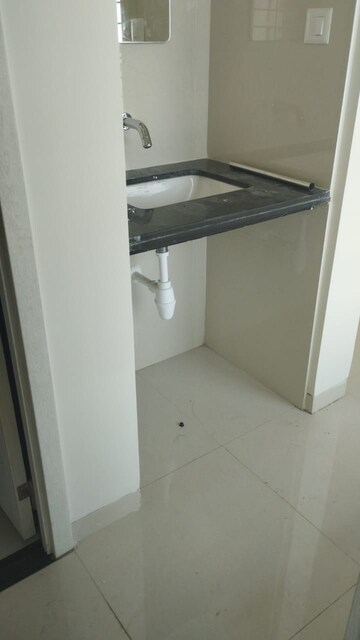 Kitchen in 1 BHK Apartment at Rama Livmo, Hinjewadi – for Rent